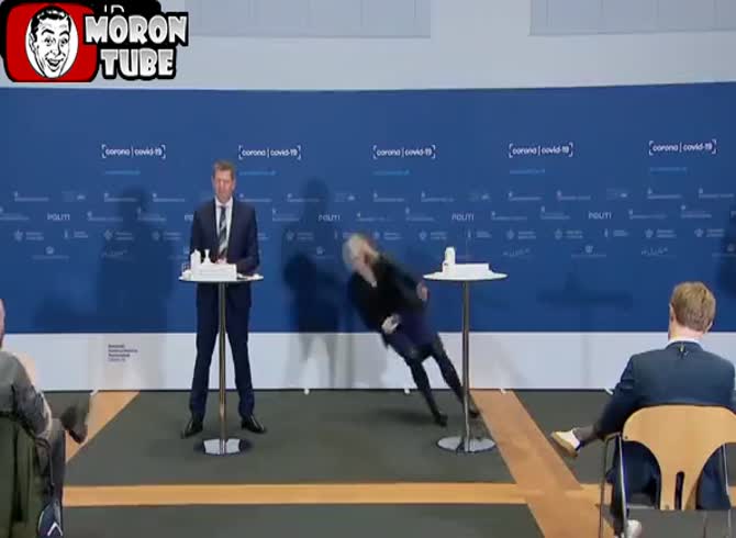 Video :During a news briefing, a top Danish official passes out